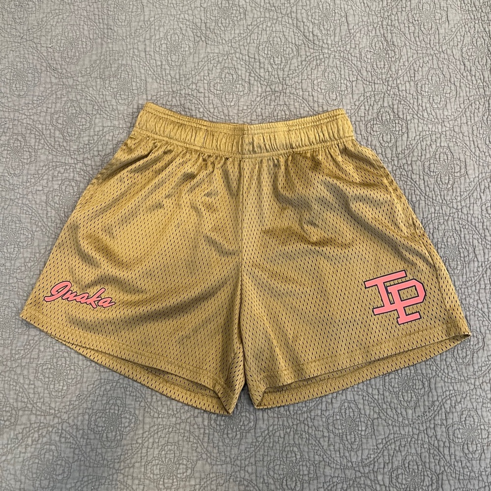 Inaka Power Gold Athletic Shorts with Pink Accents